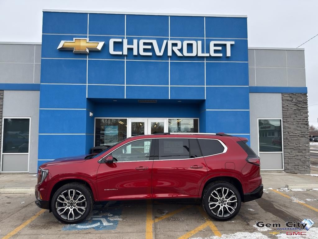 2026 GMC Acadia Denali Ultimate in Volcanic Red Tintcoat — front three-quarter view