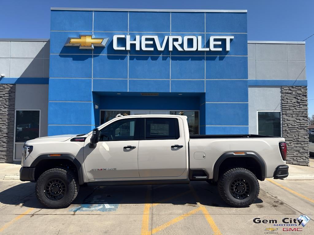 2026 GMC Sierra 2500 HD AT4X in Coastal Dune — front three-quarter view