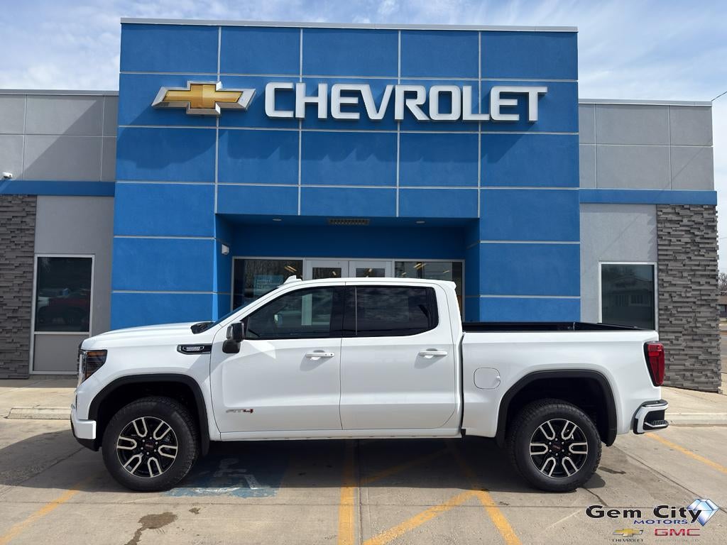 2026 GMC Sierra 1500 AT4 in Summit White — front three-quarter view