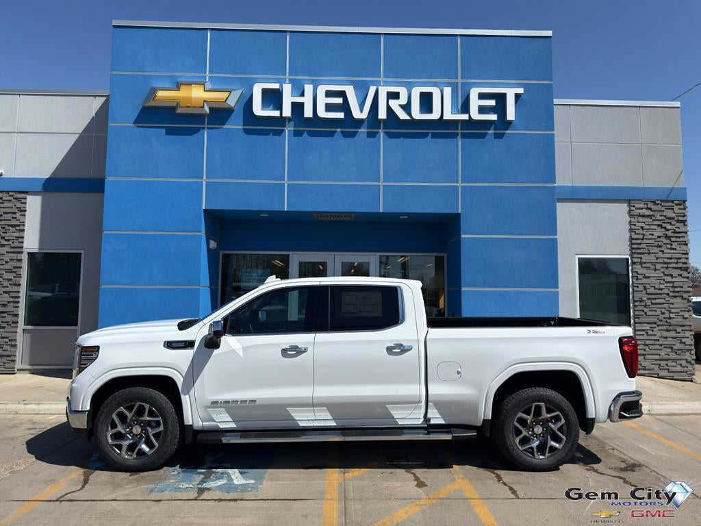 2026 GMC Sierra 1500 SLT in Summit White — front three-quarter view